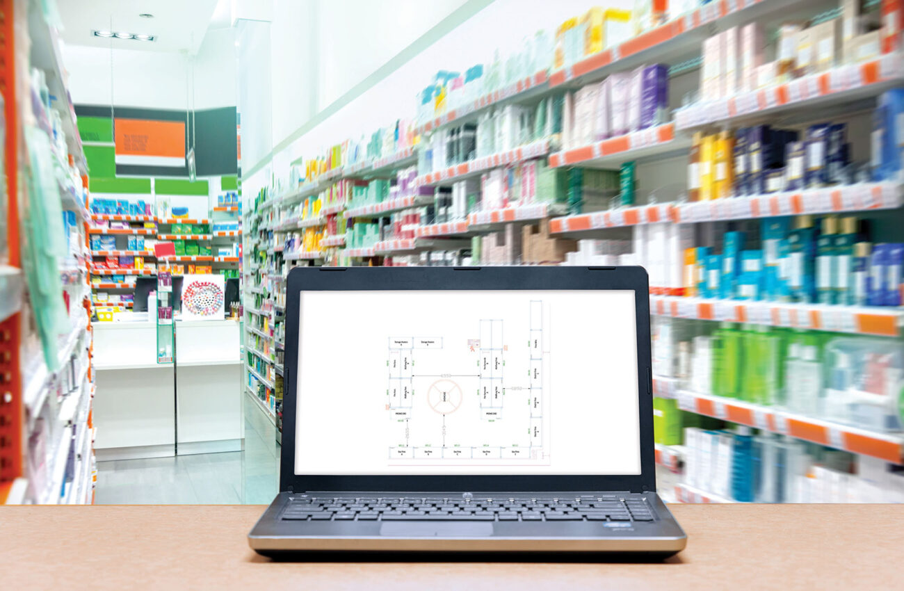 Laptop with analysis sale screen on table with blur warehouse ca