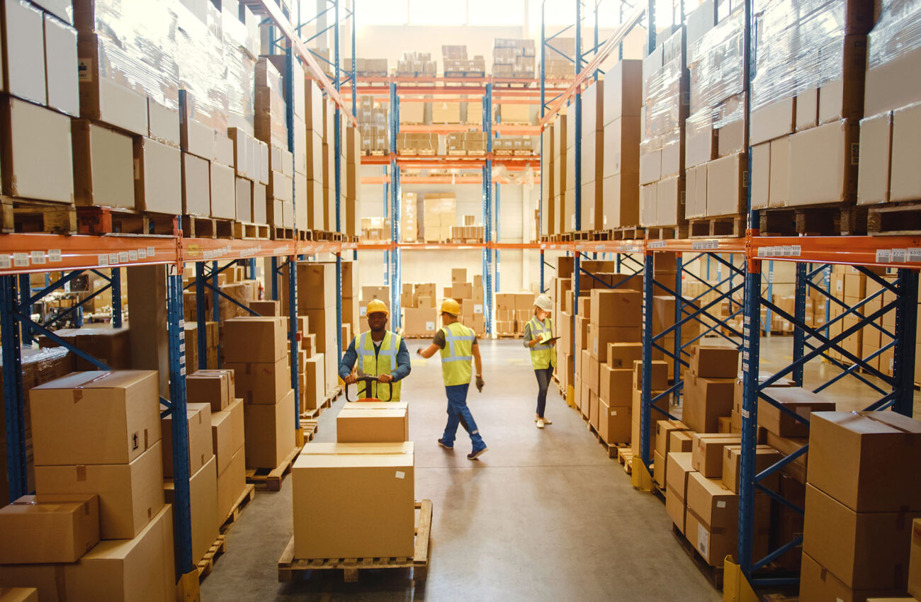 Retail Warehouse full of Shelves with Goods in Cardboard Boxes,