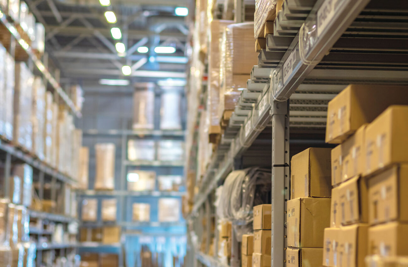 Modern warehouse with goods on shelves / focus with shallow depth of field