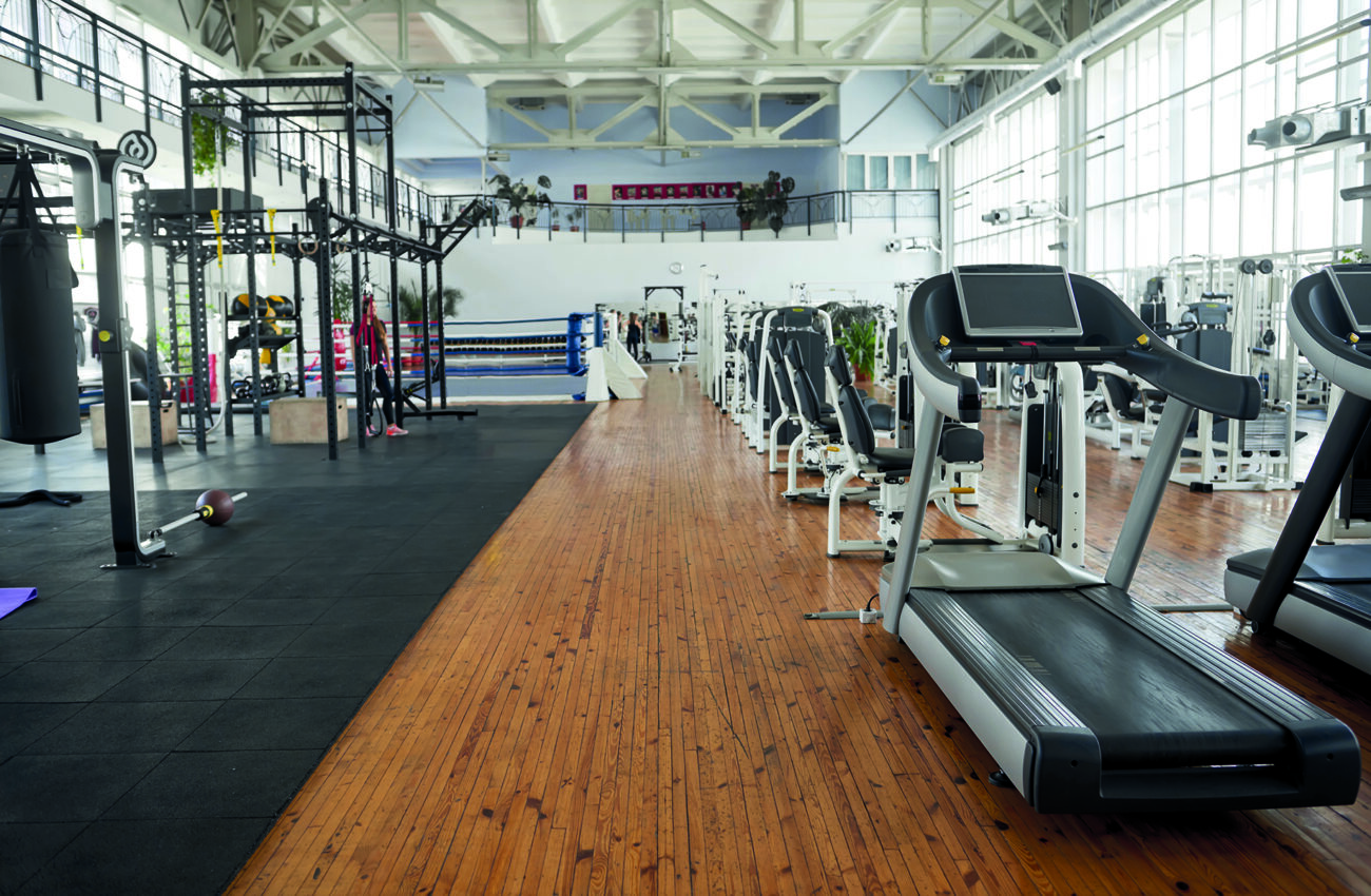Gym interior with equipment.